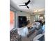Inviting living room with a flat screen television, modern furniture, and balcony access at 23 E Agate Ave # 301, Las Vegas, NV 89123