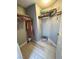 Spacious walk-in closet featuring organized racks and shelves for ample storage at 23 E Agate Ave # 301, Las Vegas, NV 89123