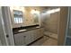 Bathroom with dual vanity and tiled shower at 23 Indian Run Way, Las Vegas, NV 89148