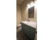 Bathroom featuring a vanity sink, storage, and neutral colored walls at 23 Indian Run Way, Las Vegas, NV 89148