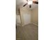 This bedroom offers wood-look flooring and a closet with sliding doors at 23 Indian Run Way, Las Vegas, NV 89148