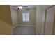 A small and bright bedroom with wood-look floors and plantation shutters on the window at 23 Indian Run Way, Las Vegas, NV 89148