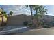 Charming single-story home with a two-car garage and well-manicured landscaping at 23 Indian Run Way, Las Vegas, NV 89148