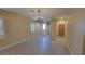 Bright living room with neutral tones and shuttered windows for a light and airy feel at 23 Indian Run Way, Las Vegas, NV 89148