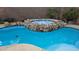 Sparkling pool and hot tub with rock accents, perfect for relaxation and outdoor enjoyment at 23 Indian Run Way, Las Vegas, NV 89148