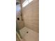 Modern shower with a rainfall shower head and decorative tiling at 23 Indian Run Way, Las Vegas, NV 89148