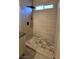 Stylish shower with modern fixtures and tiled floor at 23 Indian Run Way, Las Vegas, NV 89148