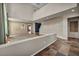 Spacious living room featuring high ceilings, textured walls, and a tiled floor at 2449 Daks Loden Ct, Henderson, NV 89044