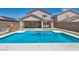 Stunning pool with built-in spa and lush landscaping, great for outdoor enjoyment at 2449 Daks Loden Ct, Henderson, NV 89044