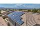 Close aerial view of a roof with solar panels at 2449 Daks Loden Ct, Henderson, NV 89044