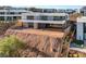Modern two-story home with large windows and a well-manicured landscape at 25 Canyon Bay Dr, Henderson, NV 89011
