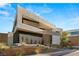 Striking modern home featuring a unique architectural design and desert landscaping at 25 Canyon Bay Dr, Henderson, NV 89011