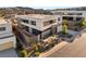Modern home with professional landscaping, flat roof, and a contemporary design at 25 Canyon Bay Dr, Henderson, NV 89011