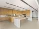 Spacious, modern kitchen featuring custom cabinets, quartz countertops, and stainless steel appliances at 25 Canyon Bay Dr, Henderson, NV 89011