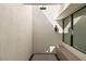 Private outdoor shower with modern fixtures and minimalist design at 25 Canyon Bay Dr, Henderson, NV 89011