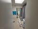 Bathroom featuring a shower, toilet, and tile flooring at 2544 Malabar Ave, Las Vegas, NV 89121