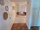 View of an entryway leading to a living room with neutral walls and tile flooring throughout at 2544 Malabar Ave, Las Vegas, NV 89121