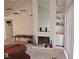 Inviting living room showcases a fireplace, built-in shelves, and plenty of space for entertaining at 2544 Malabar Ave, Las Vegas, NV 89121
