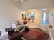 Spacious open-concept living room with kitchen and doorway access and neutral decor at 2544 Malabar Ave, Las Vegas, NV 89121