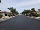 Quiet neighborhood street featuring well-maintained homes and mature trees at 2544 Malabar Ave, Las Vegas, NV 89121