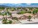 Single-Gathering home featuring well-maintained landscaping with palm trees in a desert neighborhood at 2558 Wiltshire Ave, Henderson, NV 89052