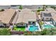 Aerial view of a single-Gathering home with a sparkling pool, covered patio, and desert landscaping at 2558 Wiltshire Ave, Henderson, NV 89052