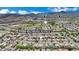 Sunridge Park is above this beautiful residential street that features mature landscaping and well-maintained desert homes at 2558 Wiltshire Ave, Henderson, NV 89052
