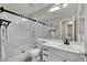 Modern bathroom with a glass-enclosed shower, sleek vanity, and contemporary fixtures at 2558 Wiltshire Ave, Henderson, NV 89052