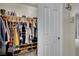 Walk-in closet with organized storage solutions and neutral colors, adding functionality and style to the space at 2558 Wiltshire Ave, Henderson, NV 89052