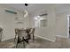 Inviting dining area with modern table and chairs, open to the living space at 2558 Wiltshire Ave, Henderson, NV 89052