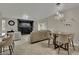 Open-concept living area showcasing the dining space, living room, and contemporary design at 2558 Wiltshire Ave, Henderson, NV 89052