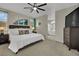 The main bedroom with an ensuite bathroom provides both comfort and convenience at 2558 Wiltshire Ave, Henderson, NV 89052