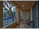 Cozy balcony with outdoor seating and community parking area views at 270 E Flamingo Rd # 131, Las Vegas, NV 89169