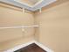 Neat closet featuring white shelving and wood floors at 270 E Flamingo Rd # 131, Las Vegas, NV 89169