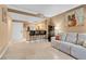 Open-concept living area featuring a breakfast bar and comfortable seating at 270 E Flamingo Rd # 131, Las Vegas, NV 89169