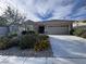 Charming single-story home with desert landscaping and a two-car garage in a quiet neighborhood at 3124 Kookaburra Way, North Las Vegas, NV 89084