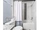 Well-lit bathroom featuring a tub with decorative tile accent and modern fixtures at 3151 Soaring Gulls Dr # 1062, Las Vegas, NV 89128