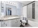 Well-lit bathroom with modern fixtures, a vanity, and a shower-tub combo at 3151 Soaring Gulls Dr # 1062, Las Vegas, NV 89128