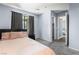 Comfortable bedroom with carpet flooring, a large window, and a closet at 3151 Soaring Gulls Dr # 1062, Las Vegas, NV 89128