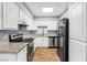 Kitchen features stainless steel appliances, granite countertops, and ample cabinet space at 3151 Soaring Gulls Dr # 1062, Las Vegas, NV 89128