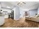 Open-concept living area features modern flooring and seamlessly connects kitchen and dining at 3151 Soaring Gulls Dr # 1062, Las Vegas, NV 89128