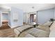 Living room with modern decor and sliding door to a private balcony at 3151 Soaring Gulls Dr # 1062, Las Vegas, NV 89128