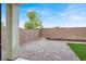 Spacious backyard with brick pavers, artificial turf and a high brick wall at 3712 Gilmore Creek St, Las Vegas, NV 89129