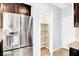 Modern kitchen featuring stainless steel appliances, and ample cabinet space with a walk-in pantry at 3712 Gilmore Creek St, Las Vegas, NV 89129