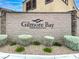 Community entrance sign for Gilmore Bay featuring decorative stone accents and manicured landscaping at 3712 Gilmore Creek St, Las Vegas, NV 89129
