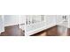 Modern staircase features wood treads and white railing at 3712 Gilmore Creek St, Las Vegas, NV 89129