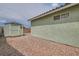A low maintenance backyard featuring a storage shed and desert landscaping at 4318 Scarlet Vista Ct, North Las Vegas, NV 89031