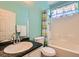 Bright bathroom with a tub, shower, vanity, and fixtures at 4318 Scarlet Vista Ct, North Las Vegas, NV 89031