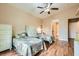 Comfortable bedroom offering twin beds, storage, and neutral tones at 4318 Scarlet Vista Ct, North Las Vegas, NV 89031