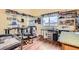 A creative hobby room with ample storage, workspace, and natural light at 4318 Scarlet Vista Ct, North Las Vegas, NV 89031